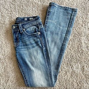 Miss Me Mid-Rise Boot Cut Medium Denim Jeans